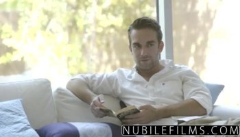 Tanned brunette lesbo fucks blonde in bed